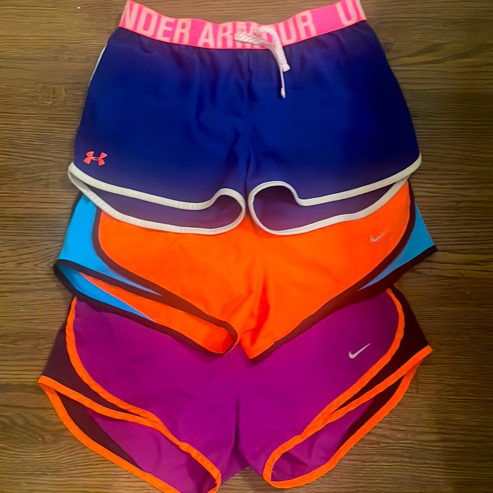 2 pairs of Nike shorts, 1 pair of under armors shorts